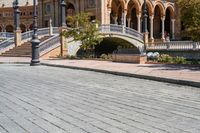 a view of the steps and sidewalks in front of an ornate building in this country town