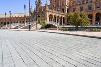 a view of the steps and sidewalks in front of an ornate building in this country town