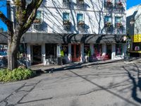 a city street with shops near a road in the town of richmond, virginia, usa