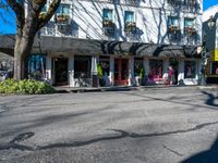 a city street with shops near a road in the town of richmond, virginia, usa