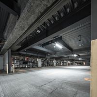 Well-lit Parking Lot with Concrete Surface