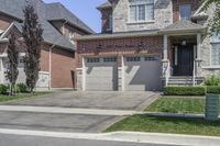 a driveway leading to the front door and driveway is well maintained with stone pavers