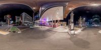 a view of the city from a fish eye lens of a train station with steps going through it