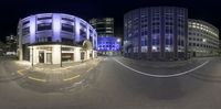 two streets and buildings are shown from the street level with 360 eye view technology on them