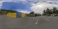 the large amount of shipping boxes are on display in this 360 - fisheye lens