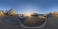 a panoramic photo of a marina in the evening hours and one of the most photographed pictures in the world