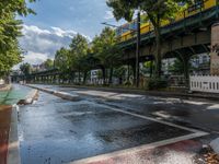 Wet Asphalt Roads in Berlin City Life