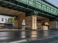 Wet Asphalt Roads Amidst Berlin's Urban Design