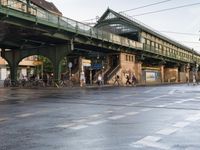 the view under the highway, on a rainy day of the city street and on the streets with buildings and bicycles