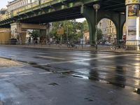 the view under the highway, on a rainy day of the city street and on the streets with buildings and bicycles