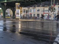 the view under the highway, on a rainy day of the city street and on the streets with buildings and bicycles