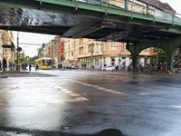 the view under the highway, on a rainy day of the city street and on the streets with buildings and bicycles