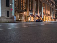 Wet Street in Tokyo at Night: Exploring the City Lights of Japan