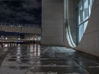 Wet Urban Road Under Artificial Light in Berlin