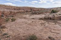 Utah's Wilderness: Escarpments and Cloud-Covered Mountains