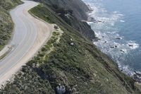 Winding Road with High Cliffs and Ocean Views