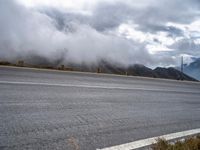 Winding Road through Highlands with Grey Sky Drama 002