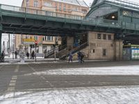 Winter Cityscape with Snow Covered Roads and Buildings