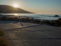 Winter Dawn on a Coastal Road: Bathed in Sunlight