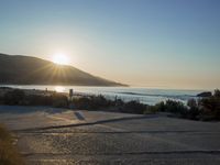 Winter Dawn on a Coastal Road: Bathed in Sunlight