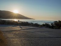 Winter Dawn on a Coastal Road: Bathed in Sunlight