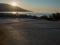 Winter Dawn on a Coastal Road: Bathed in Sunlight