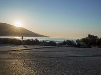 Winter Dawn on a Coastal Road: Bathed in Sunlight