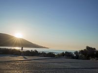 Winter Dawn on a Coastal Road: Bathed in Sunlight