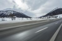 Winter Landscape in the Alps: Cloudy Sky and Snowy Mountains