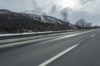 Winter Landscape in the Alps: Cloudy Sky and Snowy Mountains