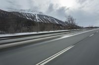 Winter Landscape in the Alps: Cloudy Sky and Snowy Mountains