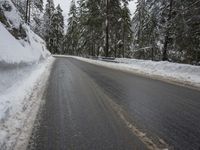 Winter Landscape: Asphalt Road and Mountains