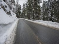 Winter Landscape: Asphalt Road and Mountains