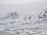 Winter landscape with mountains and fog in Iceland