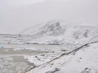 Winter landscape with mountains and fog in Iceland