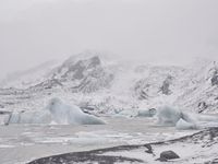 Winter landscape with mountains and fog in Iceland