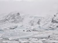 Winter landscape with mountains and fog in Iceland