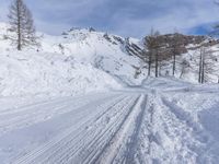 Winter Landscape: Off Road Track Through Snowy Mountains
