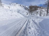 Winter Landscape: Off Road Track Through Snowy Mountains