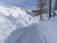 Winter Landscape: Off Road Track Through Snowy Mountains
