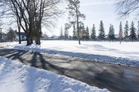 Winter Landscape: Snow Covered Road in Canada