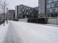 Winter Residential Area: Snow-Covered Streets and Asphalt Road