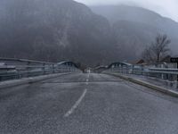 Winter Road in the Alps on a Foggy Day