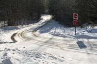 Winter Road in Canada: Clear Sky and Snowy Surroundings