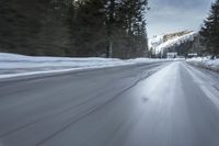 Winter Road in Germany: Snow-Clad Trees Along the Way