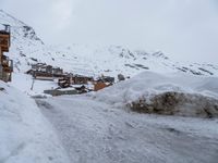 Winter Road in Residential Area of the Alps