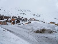 Winter Road in Residential Area of the Alps