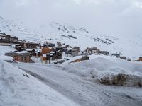 Winter Road in Residential Area of the Alps