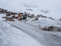 Winter Road in Residential Area of the Alps