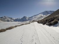 Winter Road Through Mountains